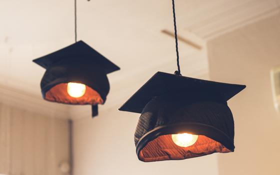 Graduation caps hanging as lights (Suad Kamardeen)