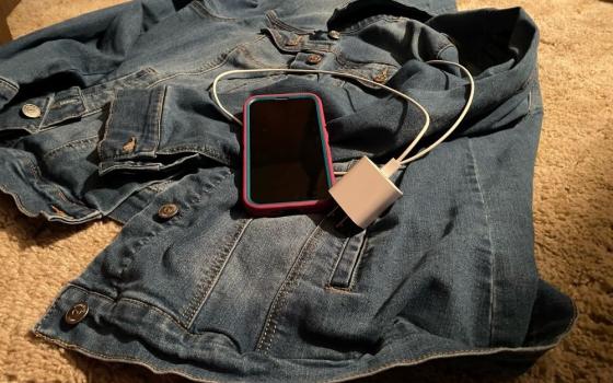 A denim jacket and a cellphone