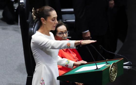 Claudia Sheinbaum takes the oath as Mexico's new president at the Congress in Mexico City Oct. 1. Sheinbaum, 62, an environmental scientist and former mayor of Mexico City, became Mexico's first female president in the nation's more than 200 years of independence. (OSV News/Reuters/Henry Romero)