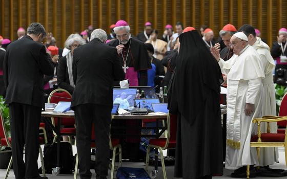 Pope Francis gives his blessing to members of the Synod of Bishops on synodality after the synod's final working session Oct. 26, 2024, in the Paul VI Audience Hall at the Vatican. (CNS/Vatican Media)