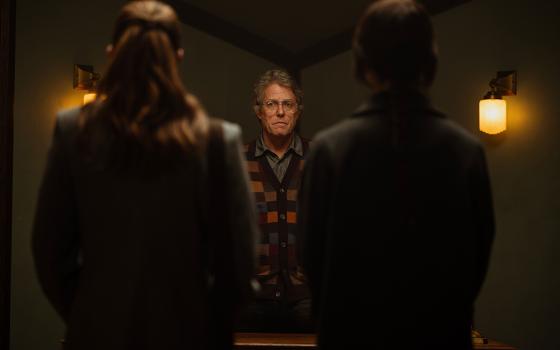 "Heretic" follows two Mormon missionaries, Sister Barnes (Sophie Thatcher) and Sister Paxton (Chloe East) as the visit the home of Mr. Reed (Hugh Grant), who begins questioning the religious beliefs of the women before subjecting them both to a claustrophobic roster of horrors that put to test the beliefs once so eagerly held. (A24 Press)