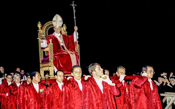 Pope Paul VI is carried in procession on the sedia gestatoria, a ceremonial throne, in this undated photo. Pope Paul, who served as pope from 1963-1978, is most remembered for his 1968 encyclical, Humanae Vitae, which affirmed the church's teaching against artificial contraception. (CNS/Catholic Press Photo/Giancarlo Giuliani)