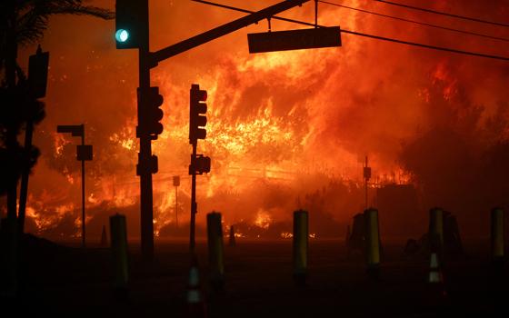 A signal light goes green on the Pacific Coast Highway during a weather-driven windstorm in Los Angeles Jan. 7, 2025, that fueled ferocious wildfires. (OSV News/Reuters/Daniel Cole)