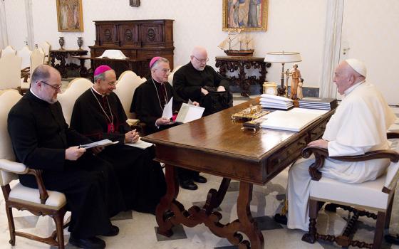 Pope Francis holds his spring meeting with the officers of the U.S. Conference of Catholic Bishops April 18, 2024, at the Vatican. Seated from left are: Fr. Michael J.K. Fuller, the conference's general secretary; Archbishop William Lori of Baltimore, vice president; Archbishop Timothy P. Broglio, president and head of the U.S. Archdiocese for the Military Services; and Fr. Paul B.R. Hartmann, associate general secretary. (CNS/Vatican Media)