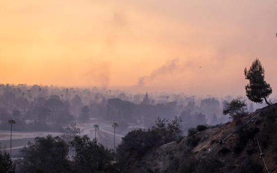 Smoke rises as the wildfires burn in the Los Angeles area Jan. 9. One of the biggest fires, the Eaton Fire in Altadena, Calif., badly damaged the Mater Dolorosa Passionist Retreat Center in Sierra Madre. (OSV News/Reuters/Ringo Chiu)