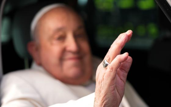 Pope Francis waves to visitors from a car as he arrives in St. Peter’s Square to preside over Mass for the Jubilee of the Armed Services, Police and Security Personnel at the Vatican Feb. 9, 2025. (CNS photo/Lola Gomez)