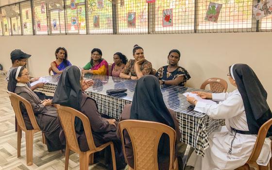 Sisters and residents discuss plans for a musical at Jyothis Bhavan, a short-stay home in Kochi, southern Kerala, India, for young transgender people hoping to integrate into the social mainstream. (Binu Alex)