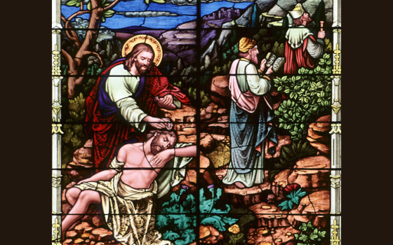 A stained-glass window at Sacred Heart Church in Freeport, Minnesota, depicts the good Samaritan. The 2,000-year-old parable of the good Samaritan is the anchor of the encyclical "Fratelli Tutti, on Fraternity and Social Friendship." (CNS/The Crosiers/Gene Plaisted)