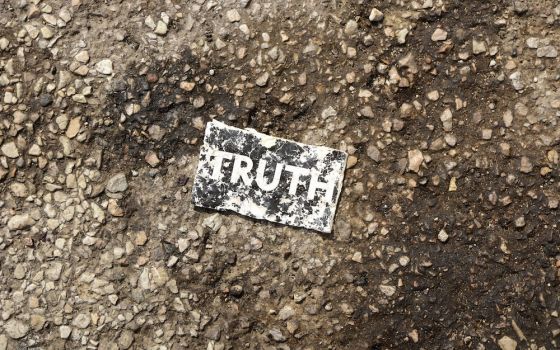 card with word "truth" on it on the ground