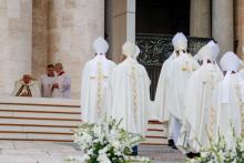 Bishops process toward the altar in St. Peter's Square during Mass with Pope Francis for the opening of the Synod of Bishops on synodality at the Vatican Oct. 2. (CNS/Lola Gomez)