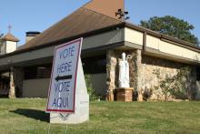 A bilingual voting sign is seen at St. Patrick Church polling station in Norcross, Ga., on Election Day 2020. Exit polls show that views about abortion, an issue Catholic Church leaders have made a priority for decades, do not necessarily motivate Catholic voters. (OSV News file photo/The Georgia Bulletin/Michael Alexander)