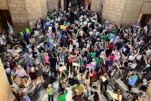 Hundreds of people gather at the Nebraska Capitol to protest against a proposed abortion ban, in Lincoln, on May 16, 2023. Millions of dollars in last-minute money is pouring into the battle over a pair of abortion-related ballot measures in Nebraska. One seeks to block abortion rights; the other would enshrine abortion rights within the state constitution. (AP/Margery Beck, file) 