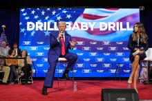 Then-candidate President Donald Trump speaks at a campaign town hall at the Greater Philadelphia Expo Center & Fairgrounds, Oct. 14, 2024, in Oaks, Pa., as moderator South Dakota Gov. Kristi Noem listens. (AP/Alex Brandon, File)