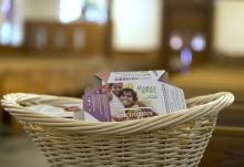 Envelopes for Catholic Relief Services' Rice Bowl program are displayed in this illustration file photo. CRS is the overseas relief and development agency of the Catholic Church in the U.S. (OSV News/Octavio Duran)